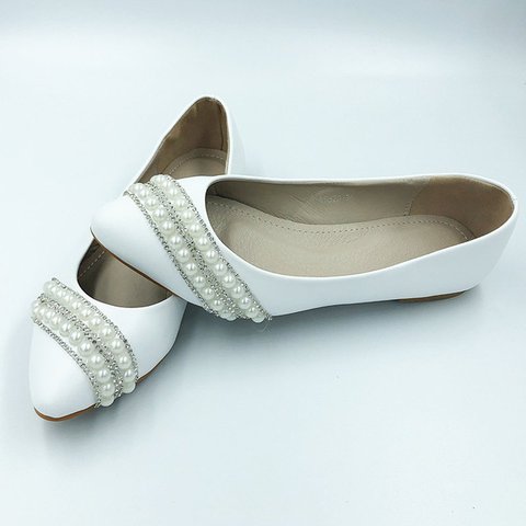 white flats with pearls